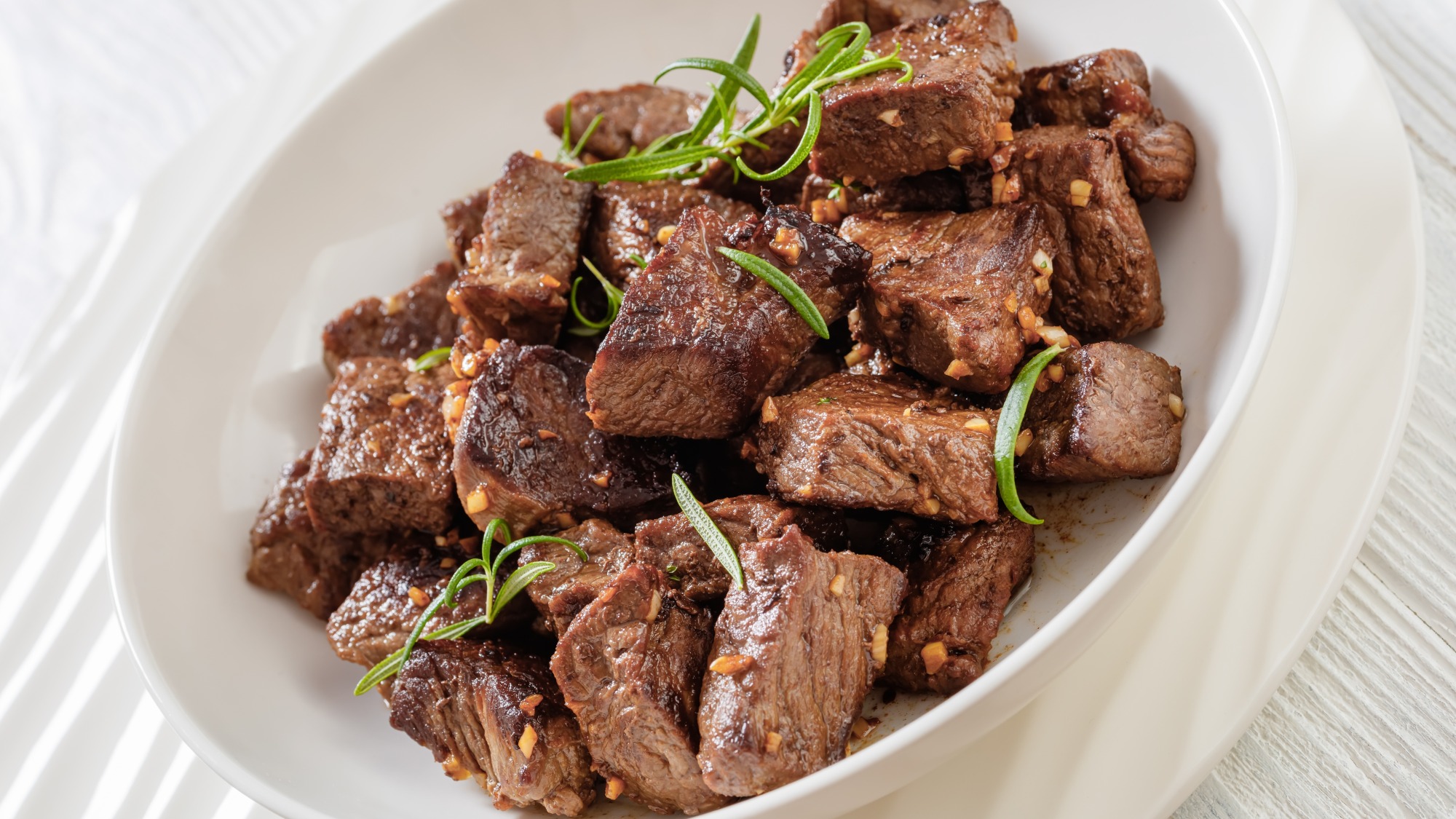 Steak bites in a bowl.