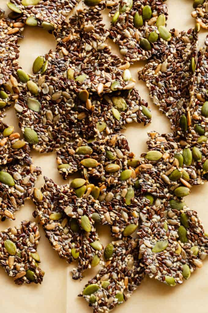 5 seed crackers on parchment paper