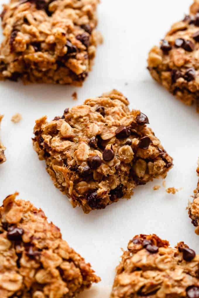 banana oatmeal bars sliced into squares topped with chocolate chips